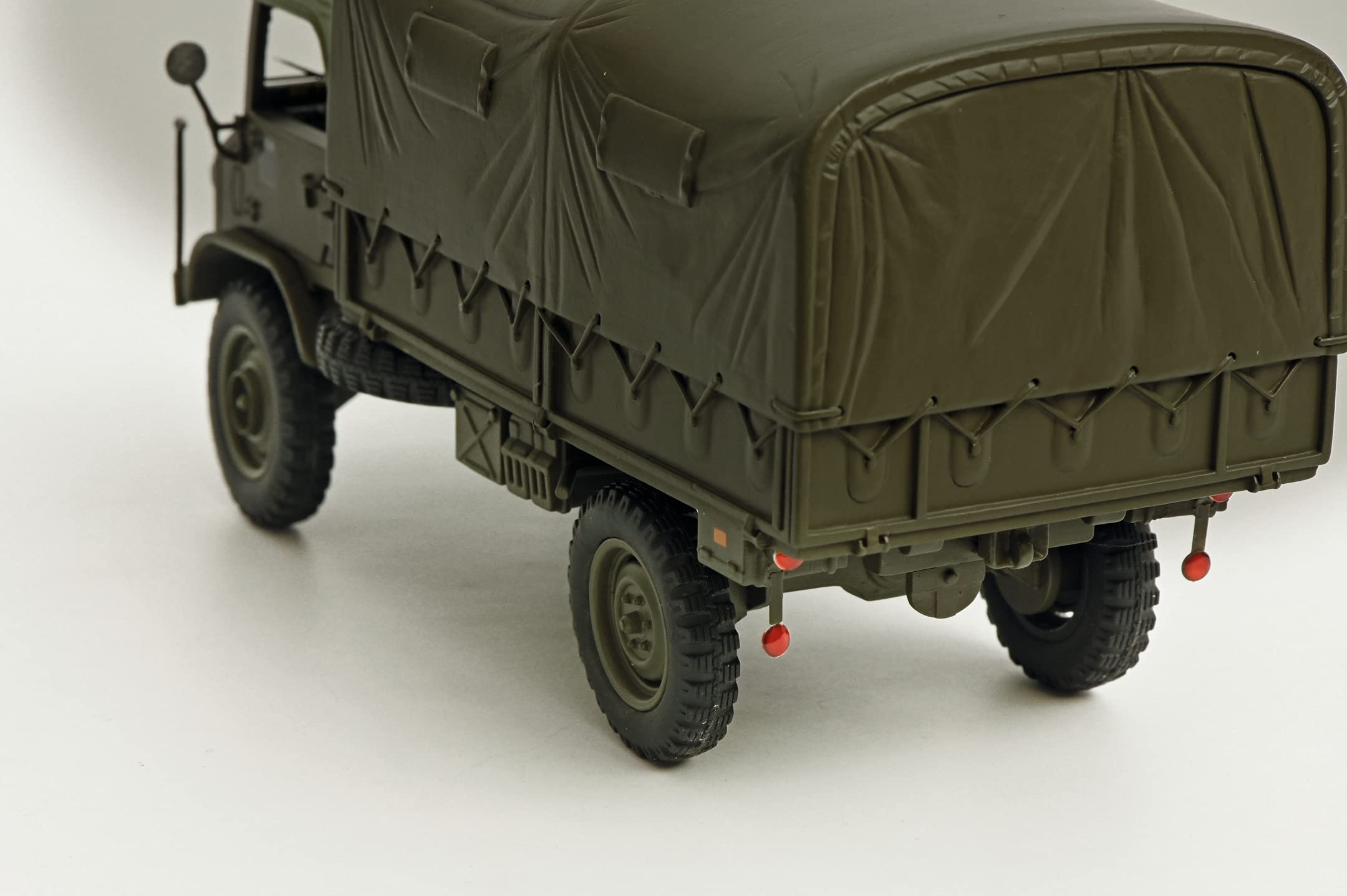 schuco-pro-r35-unimog-404-s-pritsche-plane-modellauto-1-35-oliv image 6