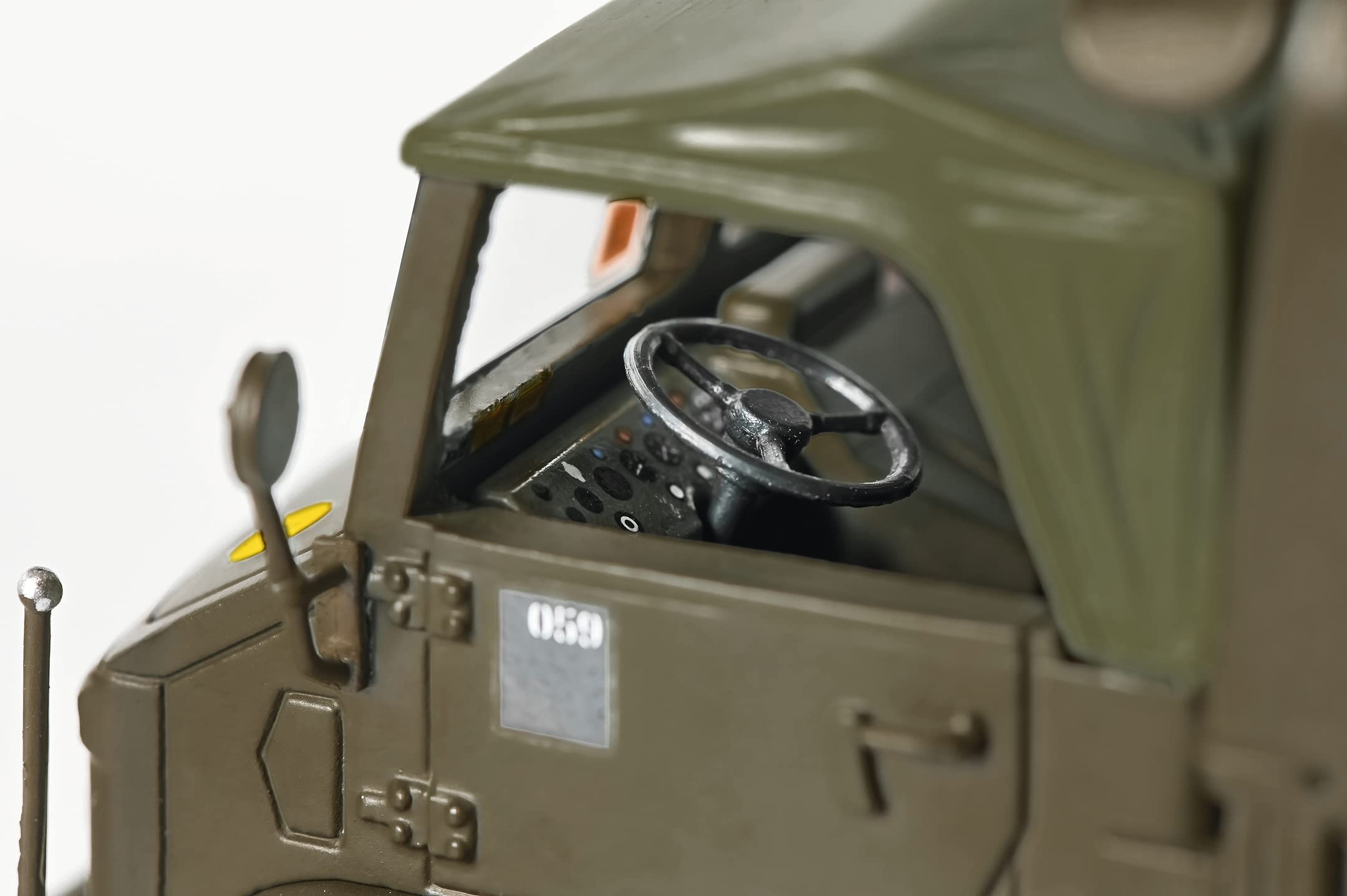schuco-pro-r35-unimog-404-s-pritsche-plane-modellauto-1-35-oliv image 7