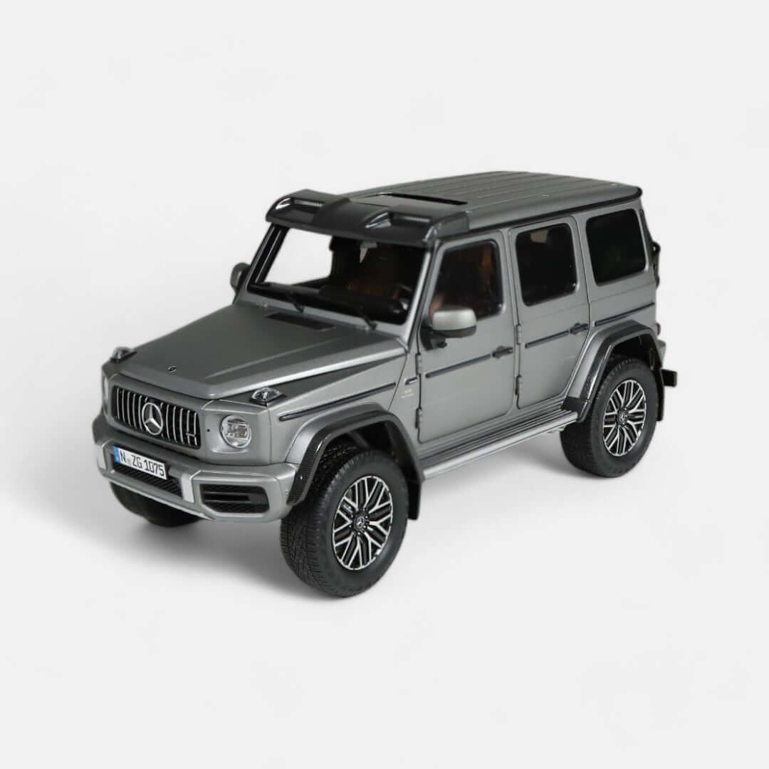 nzg-mercedes-amg-g-63-4x4-modellauto-1-18-platin-magno image 1